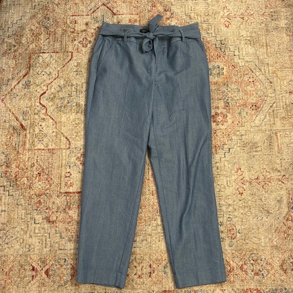 Worn once have a small amount of pulling shown on back picture